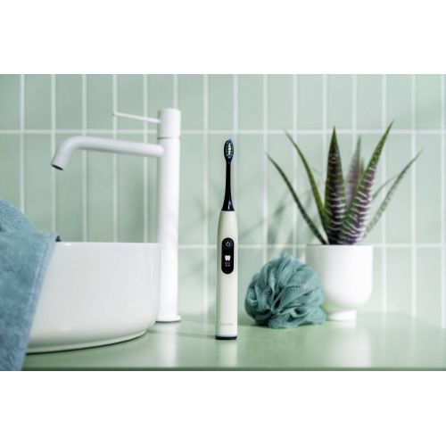 Električna zobna ščetka Beurer SC 50 Peppermint Green Planet ustna nega (svetlo zelena, vključno z 2 glavicama ščetke)