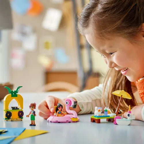 Kocke Lego Friends: Zabava ob bazenu s samorogom in flamingom (42658)